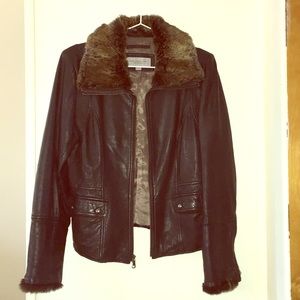 Black leather zip-up jacket with fur trim